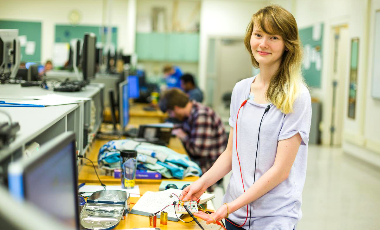 Electrical and Computer Engineering student in a laboratory on campus.